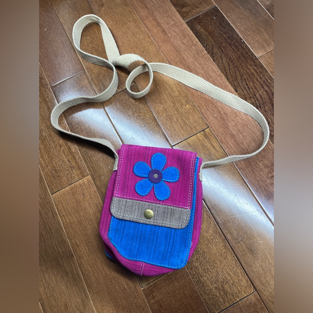 Small handmade suede crossbody bag in pink and blue.